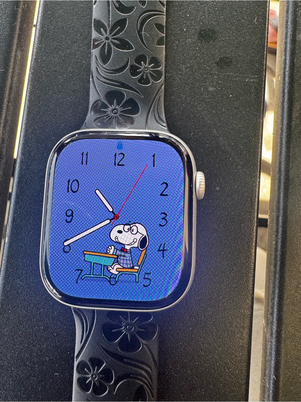 Apple Smartwatch with Black Floral Silicone Band and Blue Snoopy Dial